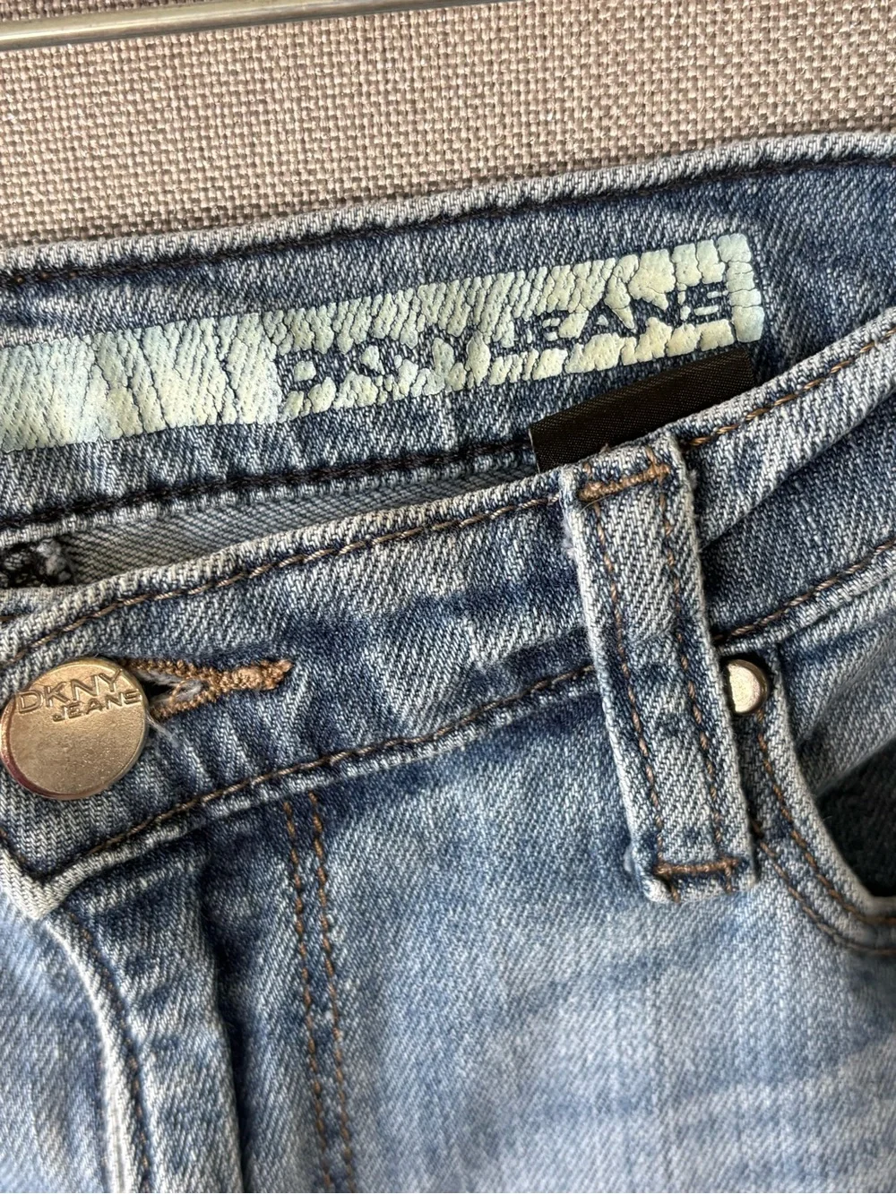 DKNY soho boot Women's Light Wash Blue Jeans size 6 fringe hem.